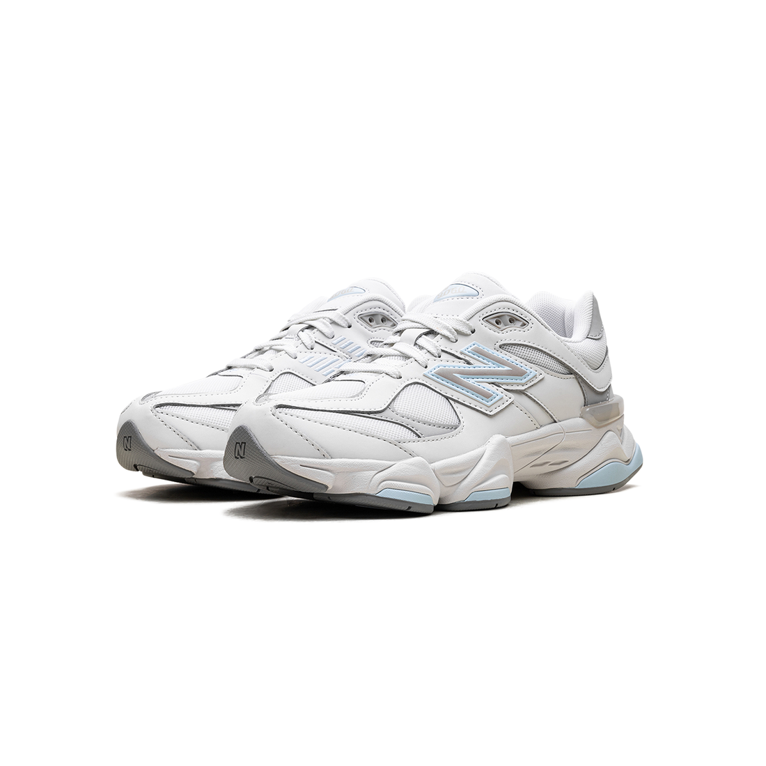 9060 Quarry Blue sneaker featuring breathable mesh upper in grey and beige tones with subtle blue accents, suede overlays, chunky cushioned sole, and Y2K-inspired design.