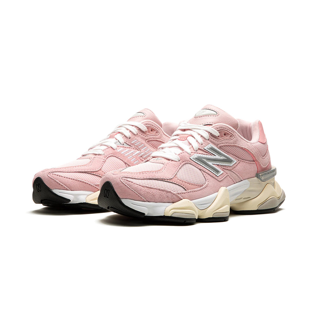 9060 Crystal Pink sneaker featuring breathable mesh upper in soft pink tones, suede overlays, chunky cushioned sole, and modern Y2K-inspired design.