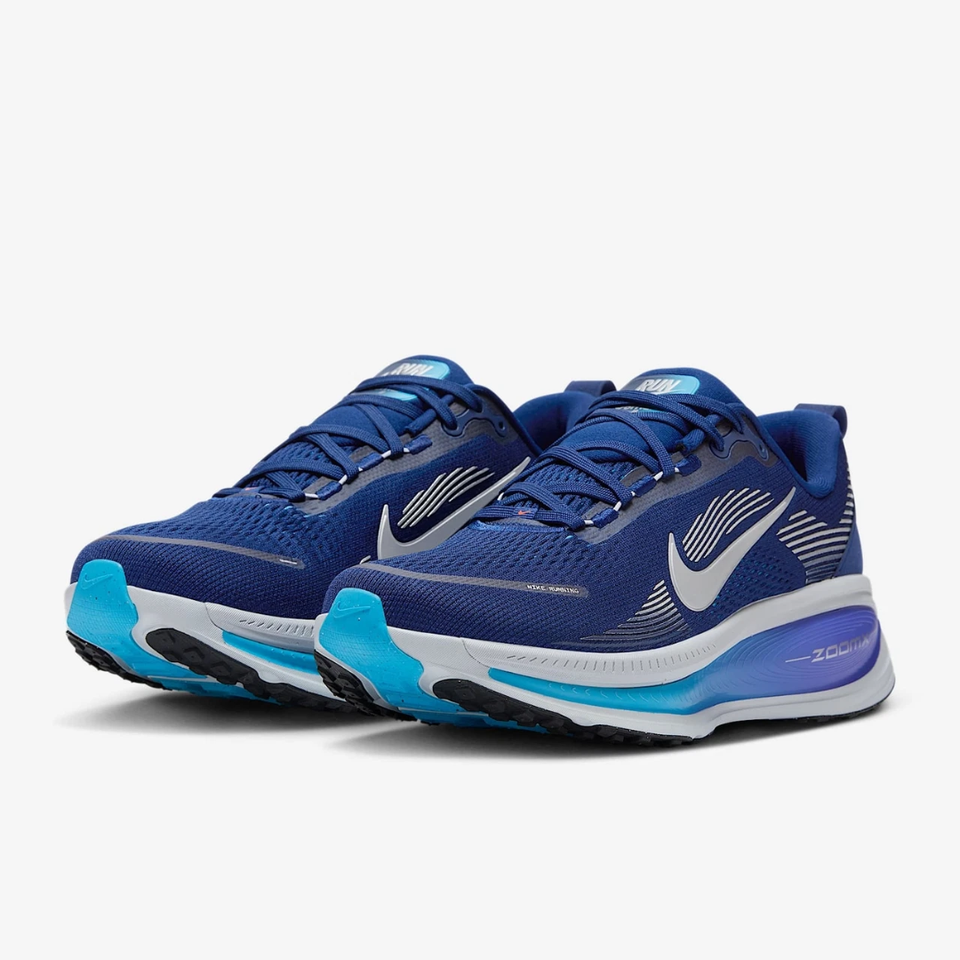 Air Zoom Vomero 18 Blue Void sneaker featuring breathable mesh upper in deep blue tones, cushioned sole with ZoomX and ReactX foam, and modern running-inspired design.
