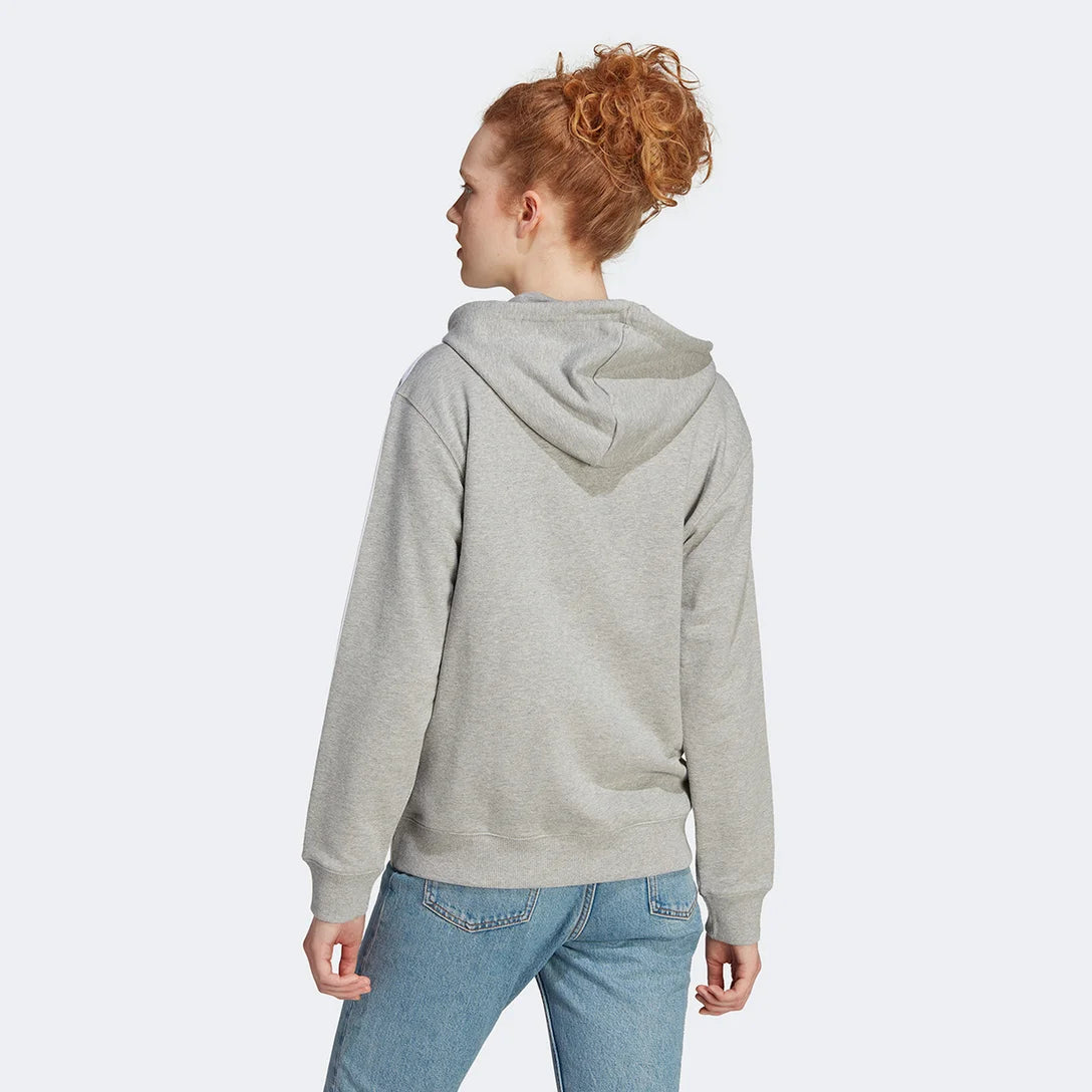 Adidas women’s grey full-zip hoodie with white 3-Stripes, front view