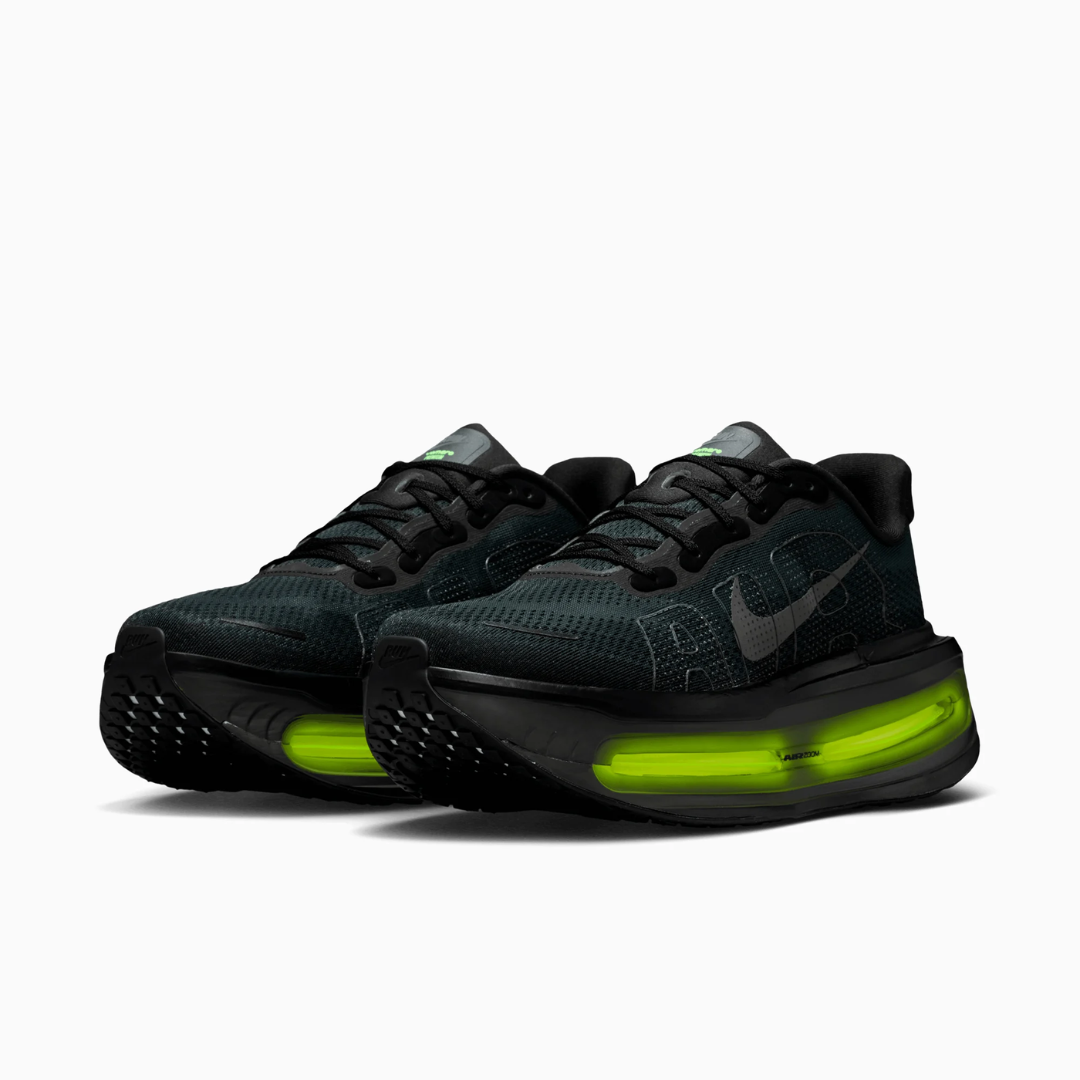 Nike Vomero Premium sneaker in black and volt featuring breathable mesh upper, ZoomX cushioning, and visible Air Zoom units designed for maximum comfort and performance.