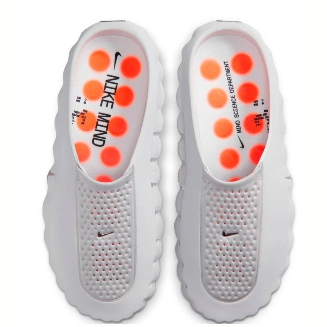 Nike Mind 001 Comfort Slide available in multiple colors including grey, red, and black, featuring a soft cushioned footbed, wide strap, and lightweight slip-on design for everyday comfort.