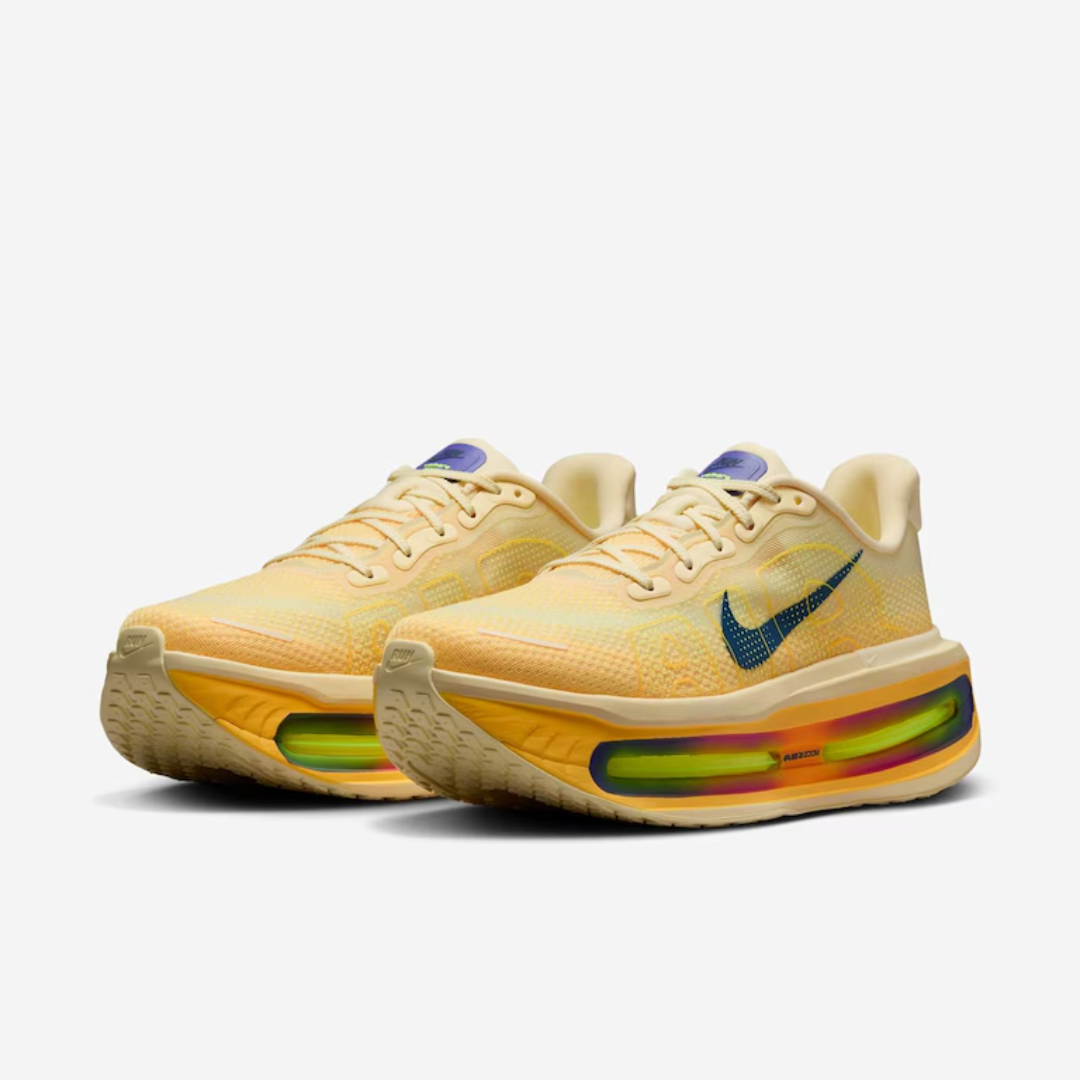 Vomero Premium Alabaster sneaker featuring breathable mesh upper in soft yellow tones, cushioned sole with Air units, and modern performance-inspired design for everyday comfort.