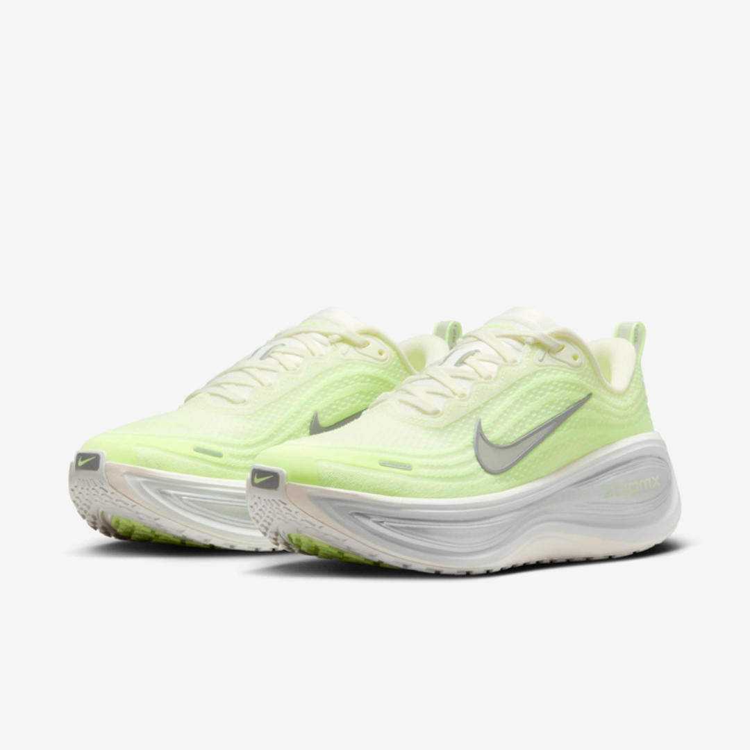 Air Zoom Vomero Plus Barely Volt sneaker featuring breathable mesh upper in neon volt tones, cushioned sole with ZoomX foam, and modern performance-inspired design.