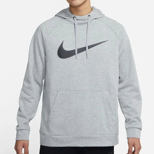 Man wearing Nike Dri-FIT Men’s Hooded Cotton Pullover — breathable sweatshirt with hood, smooth finish, and sweat-wicking design.