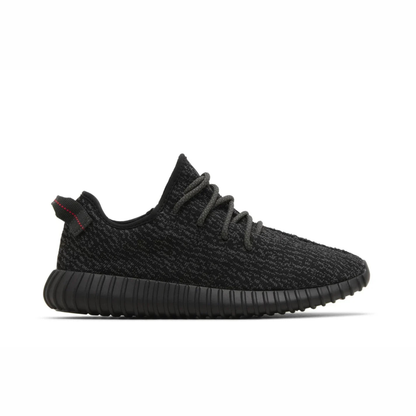 Yeezy Boost 350 V2 sneaker featuring breathable Primeknit upper, BOOST cushioned sole, ribbed outsole, and minimalist low-profile design.