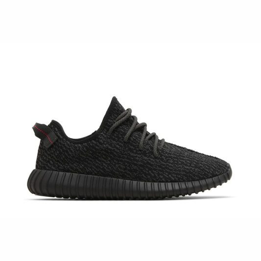Yeezy Boost 350 V2 sneaker featuring breathable Primeknit upper, BOOST cushioned sole, ribbed outsole, and minimalist low-profile design.