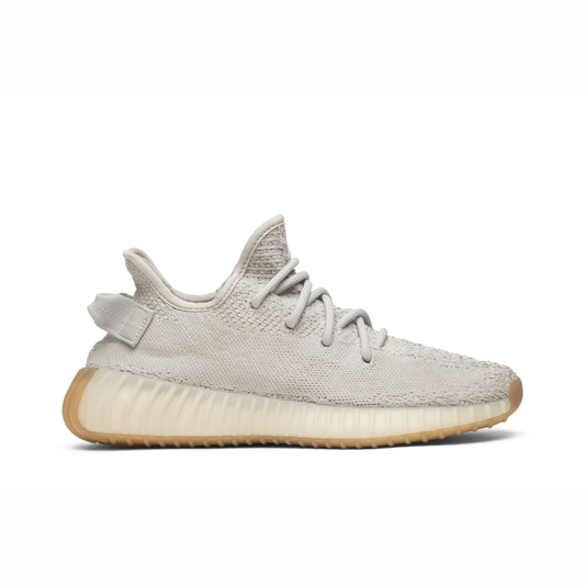 Yeezy Boost 350 V2 sneaker featuring breathable Primeknit upper, BOOST cushioned sole, ribbed outsole, and minimalist low-profile design.