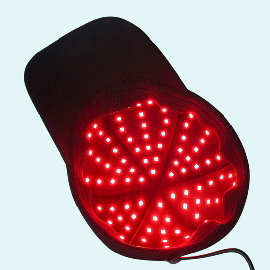 This red light therapy cap is designed to promote hair growth and reduce hair thinning. Equipped with multiple LED lights, it targets the scalp to stimulate circulation and strengthen hair follicles. Lightweight and easy to use, it provides a hands-free solution for improving hair health at home. Ideal for those seeking non-invasive hair restoration.