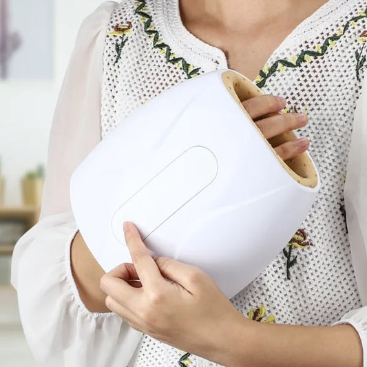 This handheld massager provides a soothing experience with air pressure and heat compression, perfect for relieving hand pain and promoting relaxation. The ergonomic design fits comfortably around your hand, offering targeted relief for stress, fatigue, and circulation. Ideal for daily use to help with hand tension and improve overall comfort.