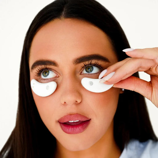 These compact pods use red light therapy to target puffiness, dark circles, and eye fatigue. The soft, ergonomic design fits comfortably under the eyes, providing soothing light therapy for rejuvenation and relaxation. Ideal for reducing signs of stress and aging around the eyes, they promote healthier, brighter eyes with regular use.