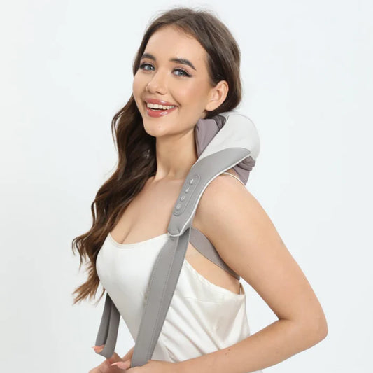 This Shiatsu neck massager provides soothing relief for sore neck and shoulder muscles. With adjustable intensity settings, it delivers a customizable massage to alleviate tension and improve circulation. Its ergonomic design ensures a comfortable fit, allowing for use at home, in the office, or on the go. The massager's easy-to-use controls make it simple to operate, and its lightweight design offers portability. Ideal for anyone seeking stress relief and relaxation after a long day.