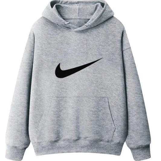 Man wearing Nike Dri-FIT Men’s Hooded Cotton Pullover — breathable sweatshirt with hood, smooth finish, and sweat-wicking design.