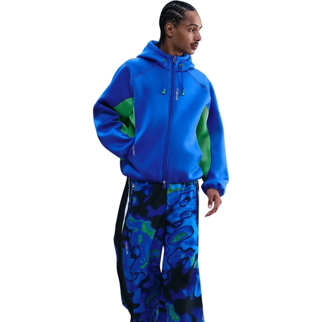 Nike Project F.R.O.G. Men’s matching set with full-zip blue hoodie and abstract patterned track pants, combining performance and bold streetwear style.