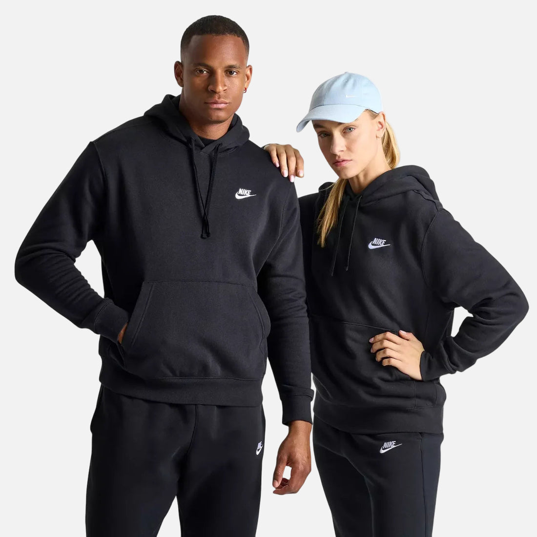 Person wearing Nike Club Fleece Embroidered Hoodie in black — brushed-back fleece pullover with embroidered detail and cozy texture.