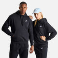 Person wearing Nike Club Fleece Embroidered Hoodie in black — brushed-back fleece pullover with embroidered detail and cozy texture.