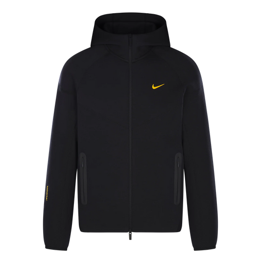 Nike x Nocta Tech Fleece Hoodie Black – premium zip-up hoodie with ergonomic fit, lightweight fleece fabric and yellow Swoosh logo on chest.