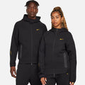 Nike x Nocta Tech Fleece Hoodie Black – men’s and women’s models wearing the full-zip hoodie showcasing unisex fit, modern sportswear style and comfort.