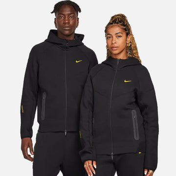 Nike x Nocta Tech Fleece Hoodie Black – men’s and women’s models wearing the full-zip hoodie showcasing unisex fit, modern sportswear style and comfort.
