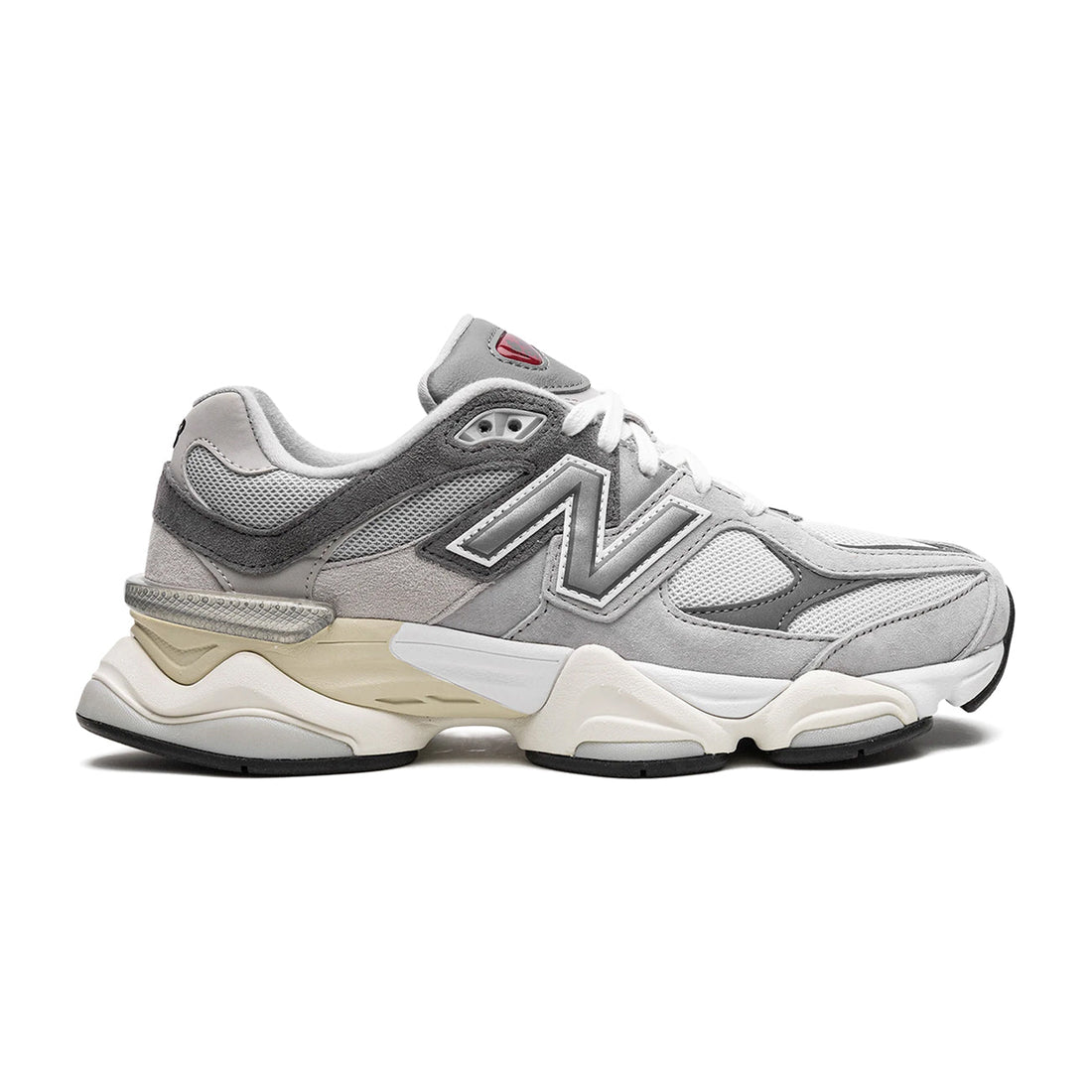 9060 Grey sneaker featuring breathable mesh upper in neutral grey tones, suede overlays, chunky cushioned sole, and modern Y2K-inspired design.