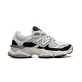 9060 Grey Jet Black sneaker featuring breathable mesh upper in grey tones with black accents, suede overlays, chunky cushioned sole, and modern Y2K-inspired design.