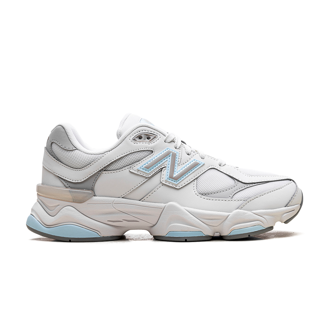 9060 Quarry Blue sneaker featuring breathable mesh upper in grey and beige tones with subtle blue accents, suede overlays, chunky cushioned sole, and Y2K-inspired design.