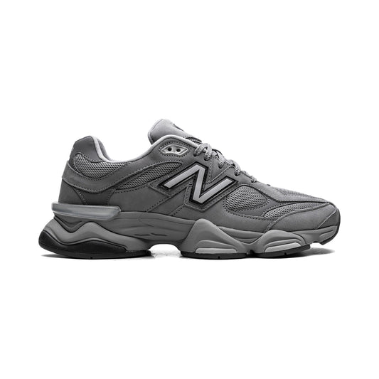 9060 Shadow Grey sneaker featuring breathable mesh upper in layered grey tones, suede overlays, chunky cushioned sole, and modern Y2K-inspired design.