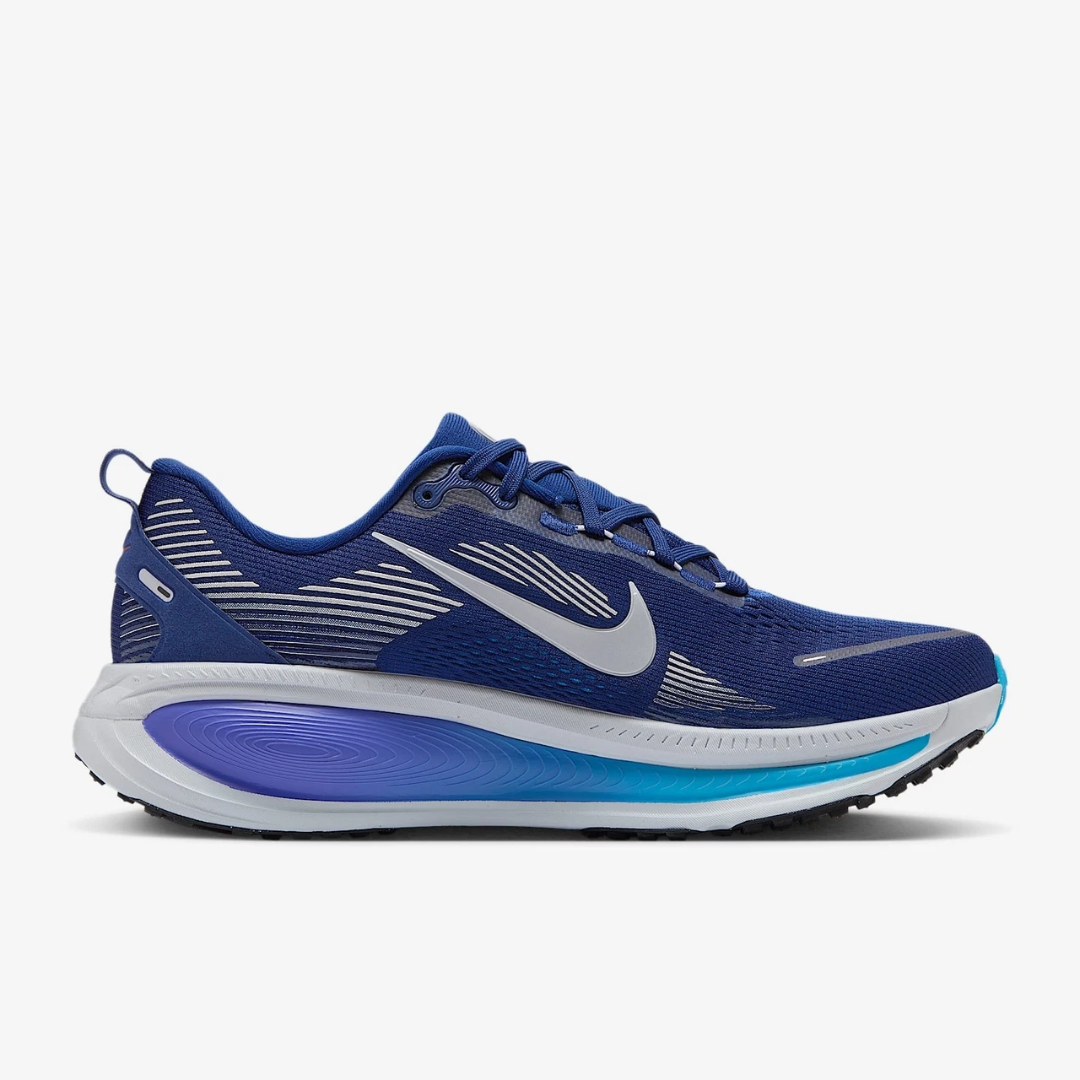 Air Zoom Vomero 18 Blue Void sneaker featuring breathable mesh upper in deep blue tones, cushioned sole with ZoomX and ReactX foam, and modern running-inspired design.