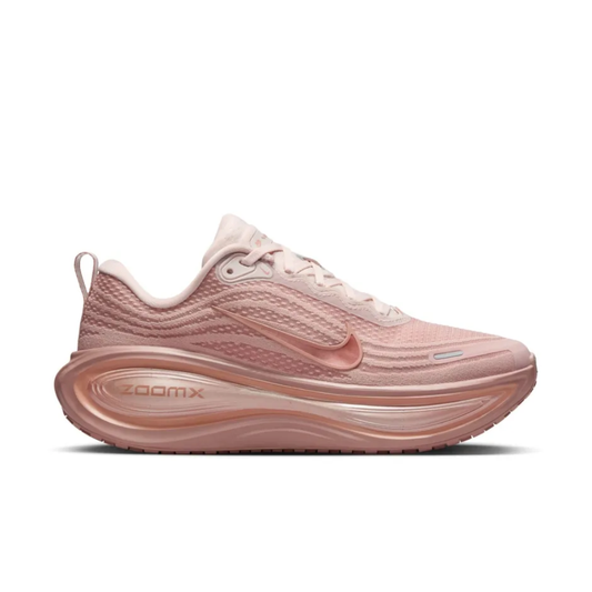 Air Zoom Vomero Plus Rose Gold sneaker featuring breathable mesh upper in soft pink tones, rose gold accents, ZoomX and ReactX cushioning, and modern performance-inspired design.
