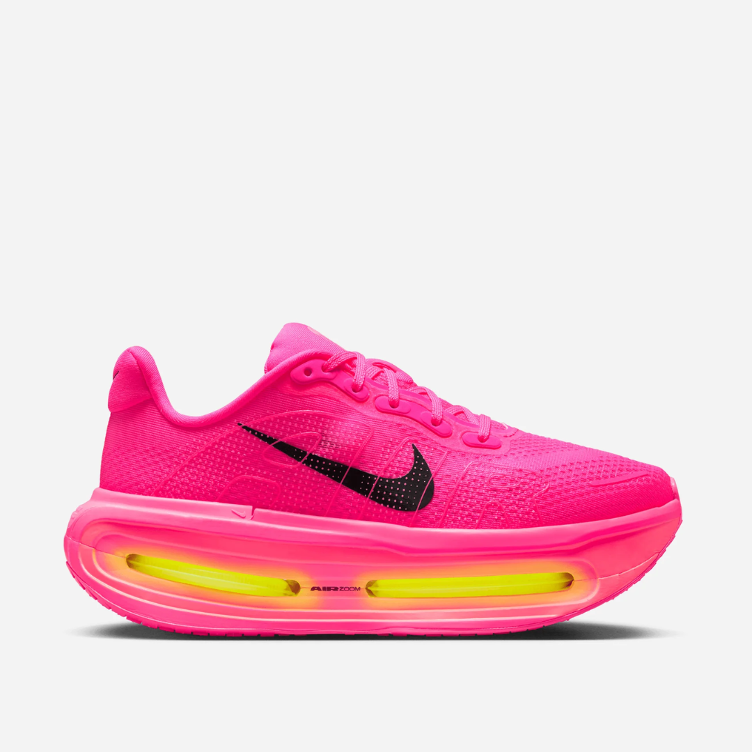 Vomero Premium Hyper Pink sneaker featuring breathable mesh upper in vibrant pink tones, cushioned sole with visible Air units, and modern performance-inspired design.