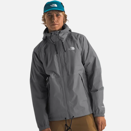 Front view of men’s The North Face Antora Rain Jacket in smoked pearl with adjustable hood and waterproof zip closure.