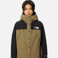 Front view of women’s Mountain Light Jacket, waterproof GORE-TEX rain shell with adjustable hood.