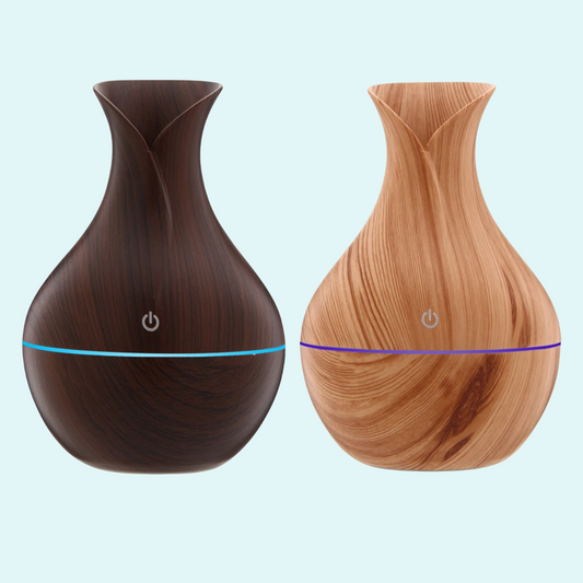 This elegantly designed USB air humidifier adds a touch of nature to your space with its wood-like finish. Compact and stylish, it gently adds moisture to the air, improving comfort and air quality. Ideal for use in your home, office, or bedroom, it’s easy to operate with a simple power button and provides a relaxing atmosphere with its subtle mist. Perfect for maintaining a fresh and hydrated environment.