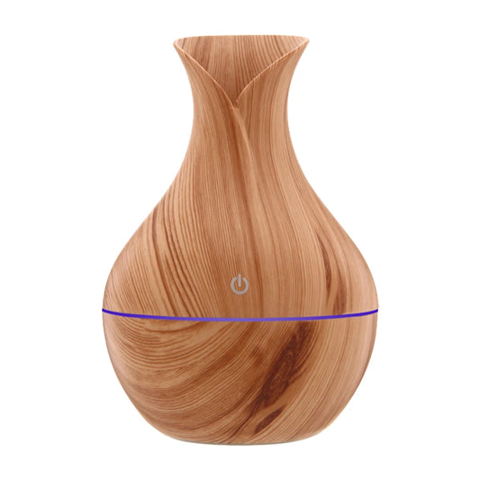 This elegantly designed USB air humidifier adds a touch of nature to your space with its wood-like finish. Compact and stylish, it gently adds moisture to the air, improving comfort and air quality. Ideal for use in your home, office, or bedroom, it’s easy to operate with a simple power button and provides a relaxing atmosphere with its subtle mist. Perfect for maintaining a fresh and hydrated environment.