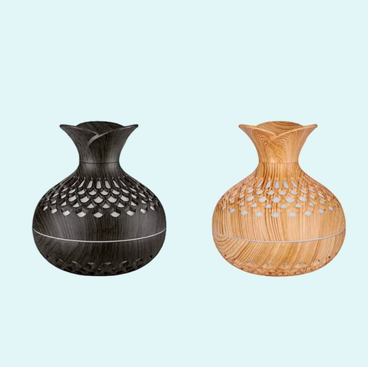This elegant woodgrain aroma diffuser and humidifier creates a calming atmosphere with its stylish design and soothing mist. 
