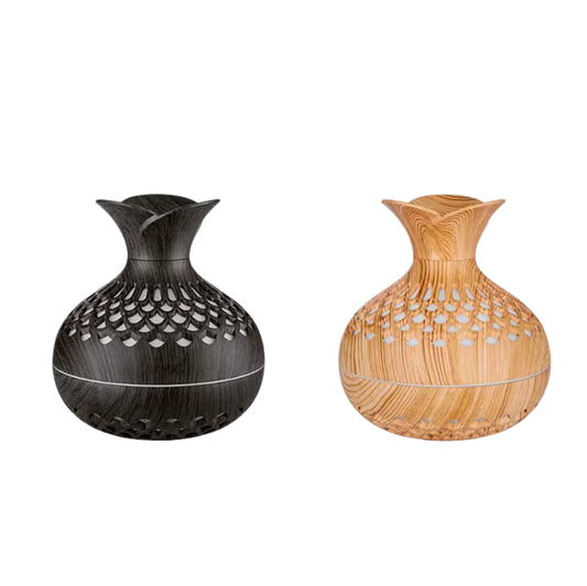 This elegant woodgrain aroma diffuser and humidifier creates a calming atmosphere with its stylish design and soothing mist. 