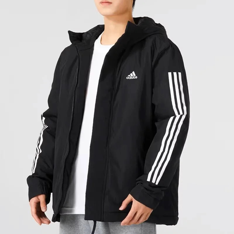 Man wearing black down jacket with hood — h igh-fill insulation, hooded design, and casual style for cold weather protection