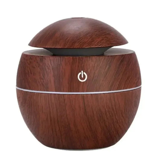 This stylish USB-powered air humidifier features a sleek wooden design, perfect for adding moisture to the air and improving room ambiance. Its compact size makes it ideal for desks, bedrooms, or office spaces. Easy to use with a simple one-touch button, it helps create a more comfortable and refreshing environment by preventing dryness.
