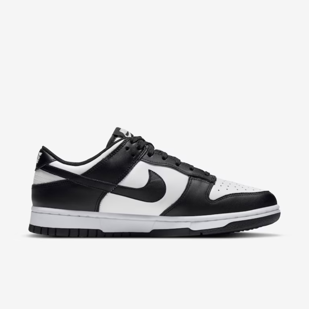 Nike Dunk Low Panda S6UU sneaker with crisp white leather base and bold black overlays in a classic low-top silhouette.