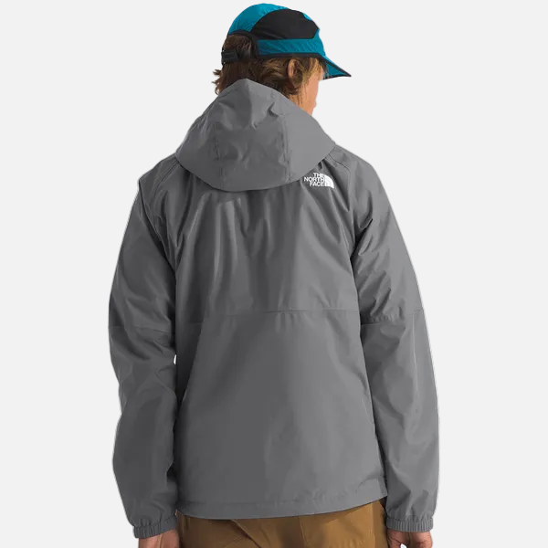 Front view of men’s The North Face Antora Rain Jacket in smoked pearl with adjustable hood and waterproof zip closure.