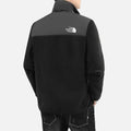 Side view of men wearing a black full-zip fleece jacket designed for warmth and everyday comfort.