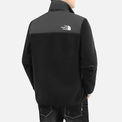 Side view of men wearing a black full-zip fleece jacket designed for warmth and everyday comfort.
